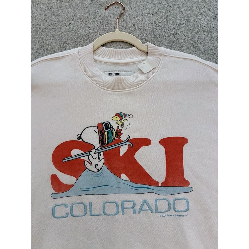 Hollister Snoopy Peanuts Ski Colorado Boxy Sweatshirt Cream Womens Large NWT - Picture 3 of 3